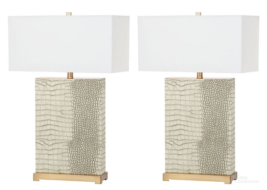 The appearance of Joyce Cream Faux Alligator 27.75 Inch Table Lamp Set of 2 designed by Safavieh in the modern / contemporary interior design. This cream piece of furniture  was selected by 1StopBedrooms from Joyce Collection to add a touch of cosiness and style into your home. Sku: LIT4402C-SET2. Product Type: Table Lamp. Image1