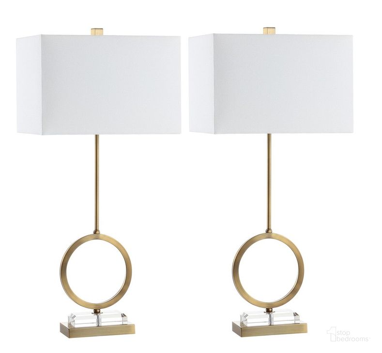 The appearance of Kaden Clear and Brass Gold Table Lamp Set of 2 designed by Safavieh in the modern / contemporary interior design. This gold piece of furniture  was selected by 1StopBedrooms from Safavieh TBL Collection to add a touch of cosiness and style into your home. Sku: TBL4193A-SET2. Product Type: Table Lamp. Material: Brass. Image1