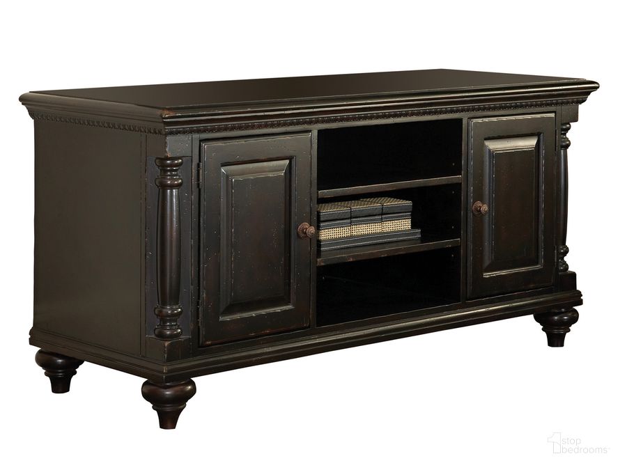 The appearance of Kingstown Rich Tamarind Harrington Media Console designed by Tommy Bahama in the traditional interior design. This brown piece of furniture  was selected by 1StopBedrooms from Kingstown Collection to add a touch of cosiness and style into your home. Sku: 01-0619-907. Material: Leather. Product Type: Media Console. Image1