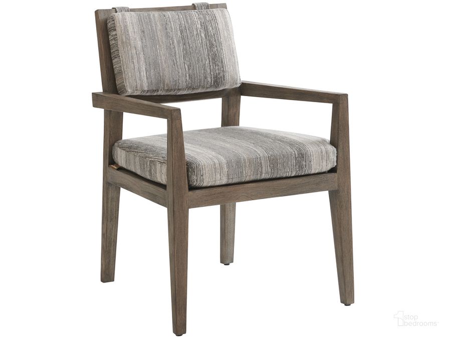 The appearance of La Jolla Arm Dining Chair 01-3950-13-40 designed by Tommy Bahama in the modern / contemporary interior design. This taupe piece of furniture  was selected by 1StopBedrooms from La Jolla Collection to add a touch of cosiness and style into your home. Sku: 01-3950-13-40. Material: Wood. Product Type: Dining Chair. Image1