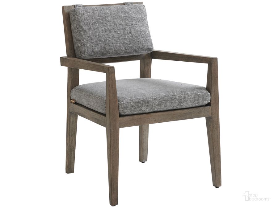 The appearance of La Jolla Arm Dining Chair 01-3950-13-41 designed by Tommy Bahama in the modern / contemporary interior design. This taupe piece of furniture  was selected by 1StopBedrooms from La Jolla Collection to add a touch of cosiness and style into your home. Sku: 01-3950-13-41. Material: Wood. Product Type: Dining Chair. Image1
