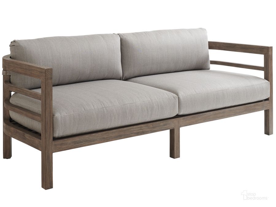 The appearance of La Jolla Sofa 01-3950-33-40 designed by Tommy Bahama in the modern / contemporary interior design. This taupe piece of furniture  was selected by 1StopBedrooms from La Jolla Collection to add a touch of cosiness and style into your home. Sku: 01-3950-33-40. Material: Wood. Product Type: Outdoor Sofa. Image1