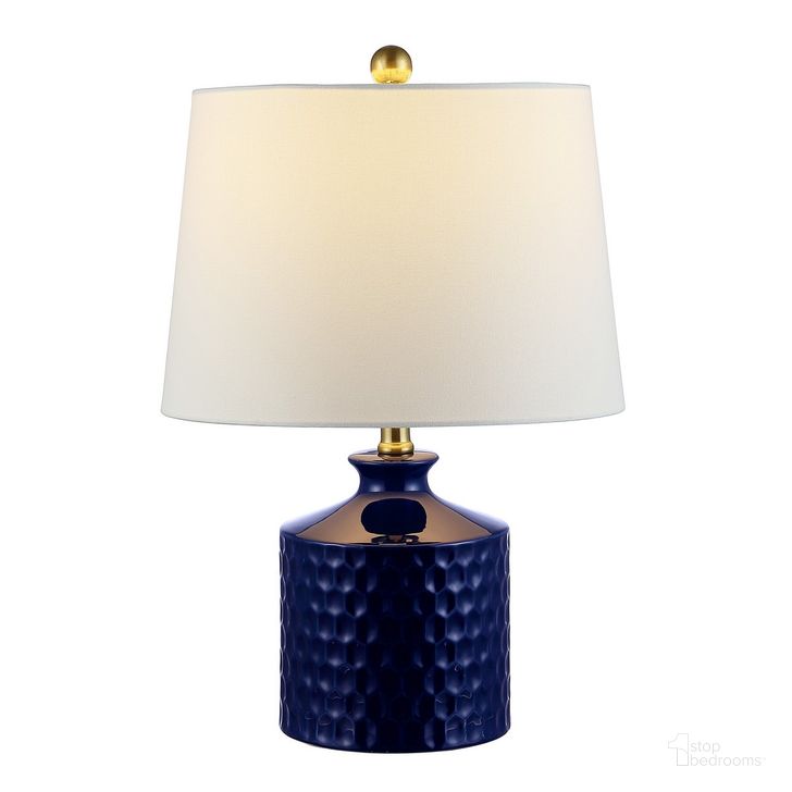 The appearance of Landon Ceramic Table Lamp in Navy Blue designed by Safavieh in the modern / contemporary interior design. This navy blue piece of furniture  was selected by 1StopBedrooms from Landon Collection to add a touch of cosiness and style into your home. Sku: TBL4339A. Material: Ceramic. Product Type: Table Lamp. Image1