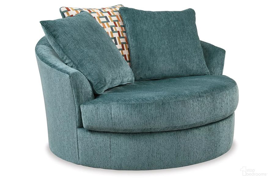 The appearance of Laylabrook Oversized Swivel Accent Chair In Teal designed by Signature Design by Ashley in the modern / contemporary interior design. This teal piece of furniture  was selected by 1StopBedrooms from Laylabrook Collection to add a touch of cosiness and style into your home. Sku: 9220621. Material: Fabric. Product Type: Accent Chair. Image1