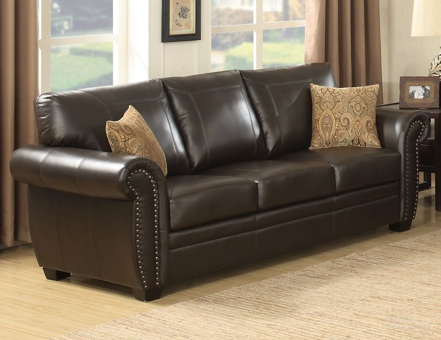 The appearance of Louis Upholstered Leather Sofa with 2 Accent Pillows In Brown designed by AC Pacific in the traditional interior design. This brown piece of furniture  was selected by 1StopBedrooms from Louis Collection to add a touch of cosiness and style into your home. Sku: LOUIS-BRN-S. Material: Leather. Product Type: Sofa. Image1