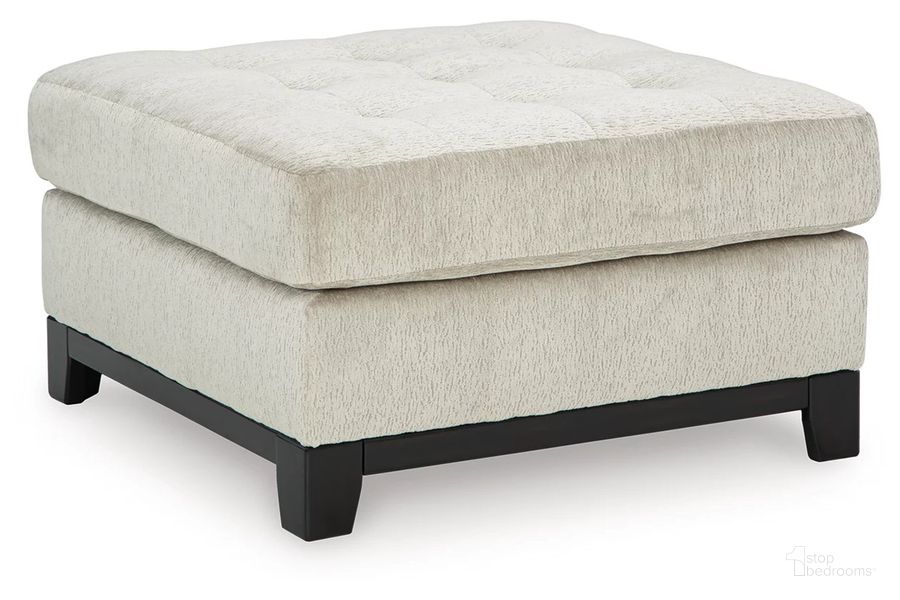 The appearance of Maxon Place Oversized Accent Ottoman In Stone designed by Signature Design by Ashley in the modern / contemporary interior design. This stone piece of furniture  was selected by 1StopBedrooms from Maxon Place Collection to add a touch of cosiness and style into your home. Sku: 3300408. Material: Wood. Product Type: Ottoman. Image1