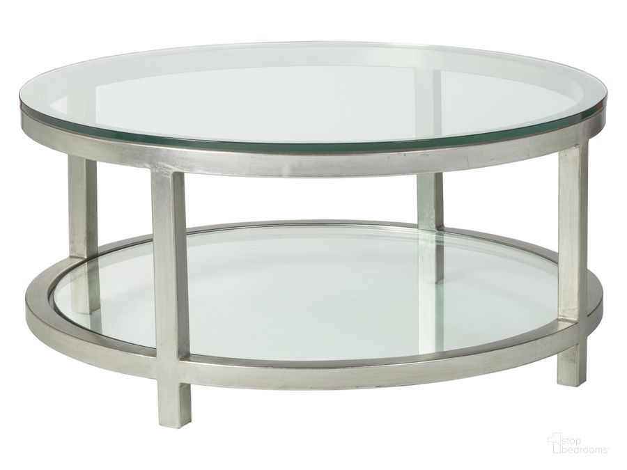 The appearance of Metal Designs Per Se Round Cocktail Table 01-2013-943-47 designed by Artistica Home in the transitional interior design. This silver leaf piece of furniture  was selected by 1StopBedrooms from Metal Designs Collection to add a touch of cosiness and style into your home. Sku: 01-2013-943-47. Product Type: Cocktail Table. Image1