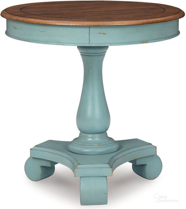 The appearance of Mirimyn Teal/Brown Accent Table designed by Signature Design by Ashley in the transitional interior design. This teal/brown piece of furniture  was selected by 1StopBedrooms from Mirimyn Collection to add a touch of cosiness and style into your home. Sku: A4000379. Material: Wood. Product Type: Accent Table. Image1