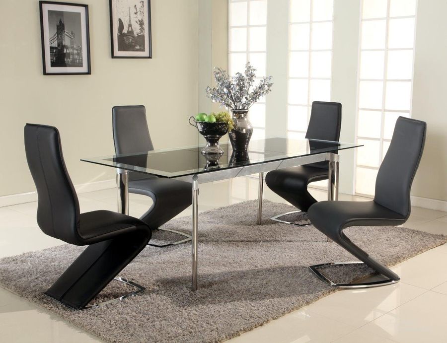 The appearance of Tara Dining Set With Extendable Glass Table And Z-Shape Chairs In Black designed by Chintaly Imports in the modern / contemporary interior design. This black piece of furniture  was selected by 1StopBedrooms from Tara Collection to add a touch of cosiness and style into your home. Sku: TARA-SC-BLK;TARA-DT-BLK. Product Type: Dining Room Set.