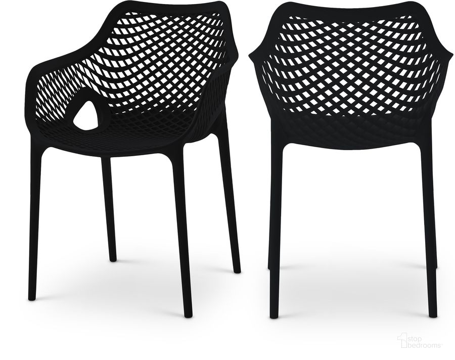 The appearance of Mykonos Outdoor Patio Dining Chair Set of 4 In Black designed by Meridian in the modern / contemporary interior design. This black piece of furniture  was selected by 1StopBedrooms from Mykonos Collection to add a touch of cosiness and style into your home. Sku: 329Black. Material: Polypropylene. Product Type: Outdoor Dining Chair. Image1