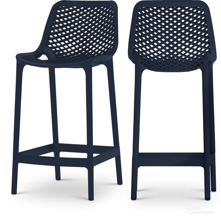 The appearance of Mykonos Outdoor Patio Stool Set of 4 In Navy designed by Meridian in the modern / contemporary interior design. This navy piece of furniture  was selected by 1StopBedrooms from Mykonos Collection to add a touch of cosiness and style into your home. Sku: 330Navy. Material: Polypropylene. Product Type: Outdoor Bar Furniture. Image1