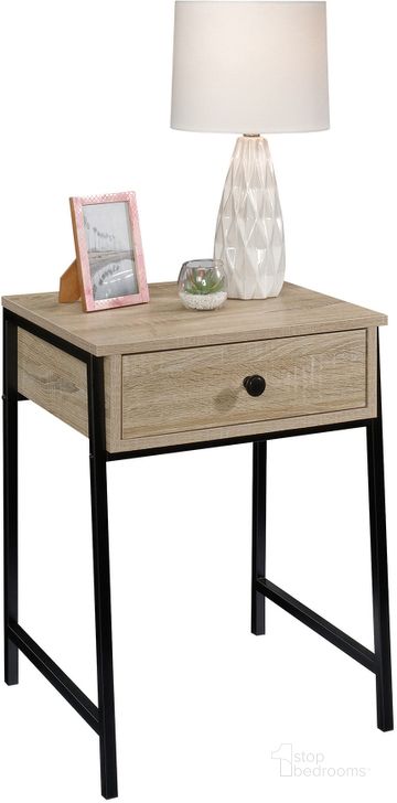 The appearance of North Avenue Night Stand In Charter Oak designed by Sauder in the transitional interior design. This charter oak piece of furniture  was selected by 1StopBedrooms from North Avenue Collection to add a touch of cosiness and style into your home. Sku: 425777. Product Type: Nightstand. Material: Engineered Wood. Image1