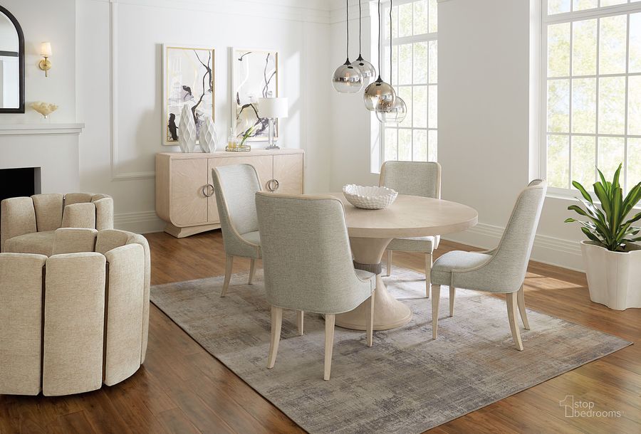 The appearance of Nouveau Chic Sandstone Round Dining Room Set designed by Hooker in the transitional interior design. This cream piece of furniture  was selected by 1StopBedrooms from Nouveau Chic Collection to add a touch of cosiness and style into your home. Sku: 6500-75203B-80;6500-75203T-80;6500-75500-80. Product Type: Dining Room Set. Material: Resin. Image1