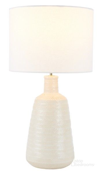 The appearance of Oakland Table Lamp in Ivory designed by Safavieh in the transitional interior design. This ivory piece of furniture  was selected by 1StopBedrooms from Oakland Collection to add a touch of cosiness and style into your home. Sku: TBL9001A. Material: Ceramic. Product Type: Table Lamp. Image1