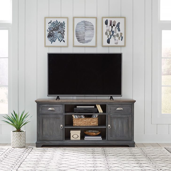 The appearance of Ocean Isle 64 Inch Entertainment Tv Stand In Black designed by Liberty in the traditional interior design. This black piece of furniture  was selected by 1StopBedrooms from Ocean Isle Collection to add a touch of cosiness and style into your home. Sku: 303G-TV64. Product Type: TV Stand. Material: Rubberwood.