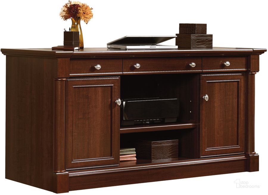 The appearance of Palladia Credenza In Select Cherry designed by Sauder in the traditional interior design. This select cherry piece of furniture  was selected by 1StopBedrooms from Palladia Collection to add a touch of cosiness and style into your home. Sku: 412079. Product Type: Credenza. Material: Engineered Wood. Image1