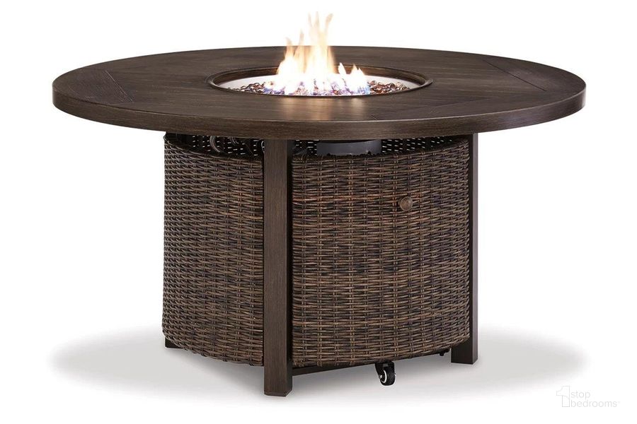 The appearance of Paradise Trail Medium Brown Outdoor Round Fire Pit Table designed by Signature Design by Ashley in the transitional interior design. This medium brown piece of furniture  was selected by 1StopBedrooms from Paradise Trail Collection to add a touch of cosiness and style into your home. Sku: P750-776. Product Type: Outdoor Table. Image1