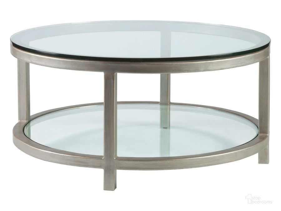 The appearance of Per Se Argento Round Cocktail Table designed by Artistica Home in the transitional interior design. This argento piece of furniture  was selected by 1StopBedrooms from Per Se Collection to add a touch of cosiness and style into your home. Sku: 01-2013-943-46. Product Type: Cocktail Table.