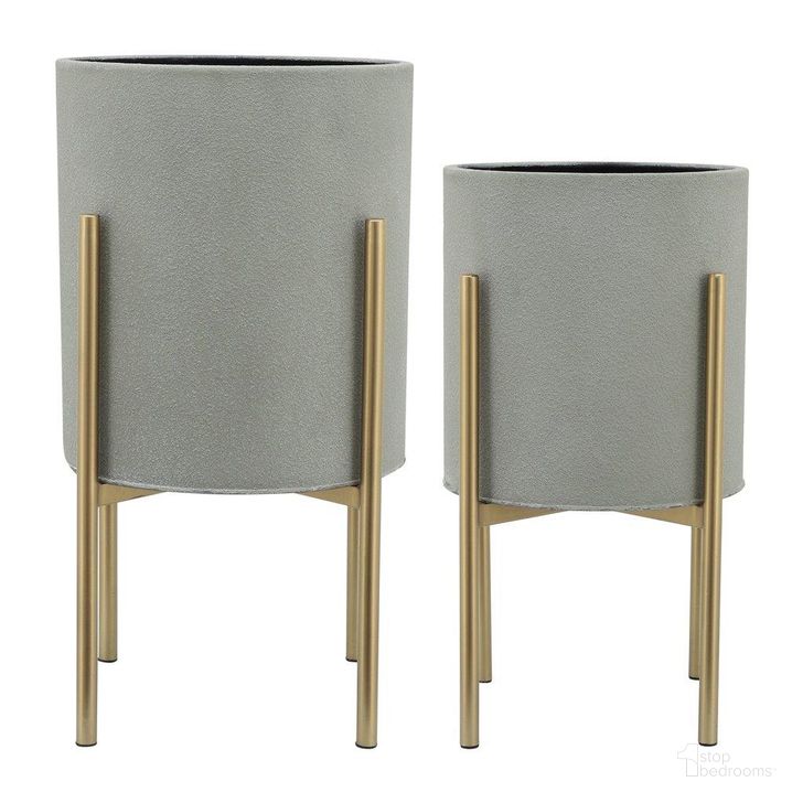 The appearance of Planter On Metal Stand Set of 2 In Putty And Gld designed by Sagebrook in the modern / contemporary interior design. This gray piece of furniture  was selected by 1StopBedrooms from  to add a touch of cosiness and style into your home. Sku: 12629-04. Product Type: Outdoor Accessory. Material: Iron. Image1