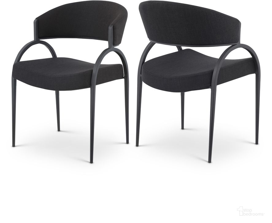 The appearance of Privet Linen Textured Fabric Dining Chair Set of 2 In Black designed by Meridian in the modern / contemporary interior design. This black piece of furniture  was selected by 1StopBedrooms from Privet Collection to add a touch of cosiness and style into your home. Sku: 931Black-C. Product Type: Dining Chair. Material: Linen. Image1
