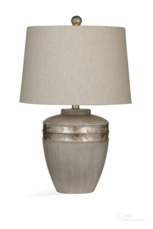 The appearance of Reflections Table Lamp In Beige and Antique Silver designed by Bassett Mirror Company in the modern / contemporary interior design. This beige piece of furniture  was selected by 1StopBedrooms from  to add a touch of cosiness and style into your home. Sku: L4276T. Product Type: Table Lamp. Material: Cement. Image1