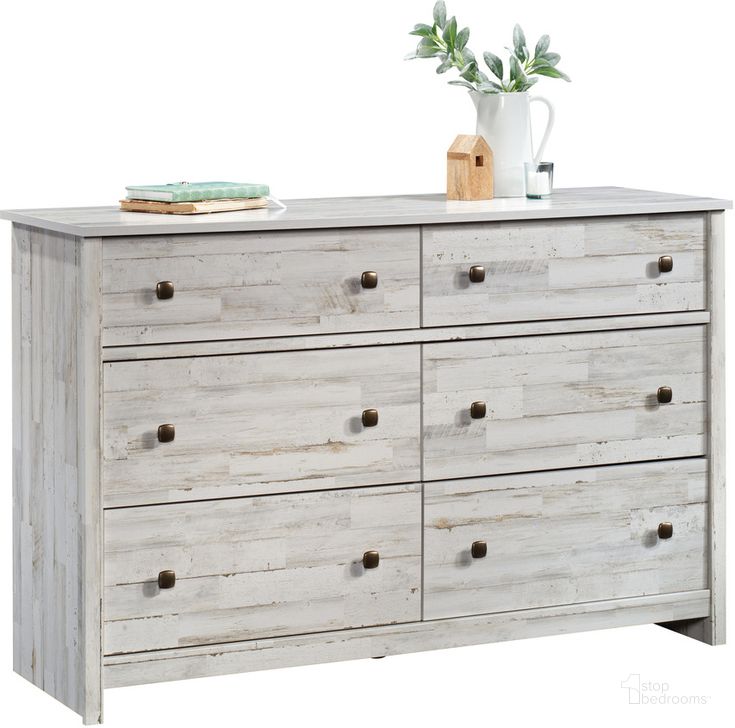The appearance of River Ranch Dresser In White Plank designed by Sauder in the transitional interior design. This white plank piece of furniture  was selected by 1StopBedrooms from River Ranch Collection to add a touch of cosiness and style into your home. Sku: 429627. Product Type: Dresser. Material: Engineered Wood. Image1
