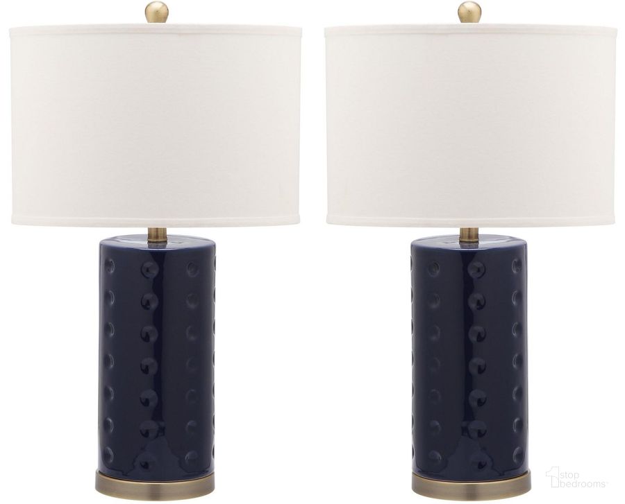 The appearance of Roxanne Navy Table Lamp Set of 2 designed by Safavieh in the modern / contemporary interior design. This navy piece of furniture  was selected by 1StopBedrooms from Roxanne Collection to add a touch of cosiness and style into your home. Sku: LIT4152A-SET2. Product Type: Table Lamp. Image1