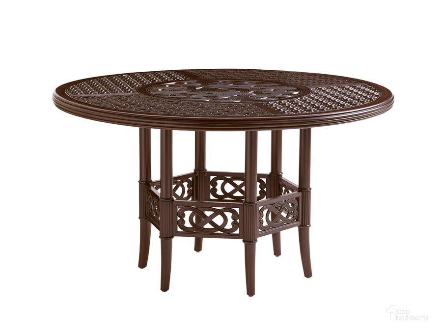 The appearance of Royal Kahala Black Sands Dining Table w/Cast Top designed by Tommy Bahama in the traditional interior design. This dark brown piece of furniture  was selected by 1StopBedrooms from Royal Kahala Black Sands Collection to add a touch of cosiness and style into your home. Sku: 01-3235-875C. Product Type: Outdoor Dining Table. Size: 54". Image1
