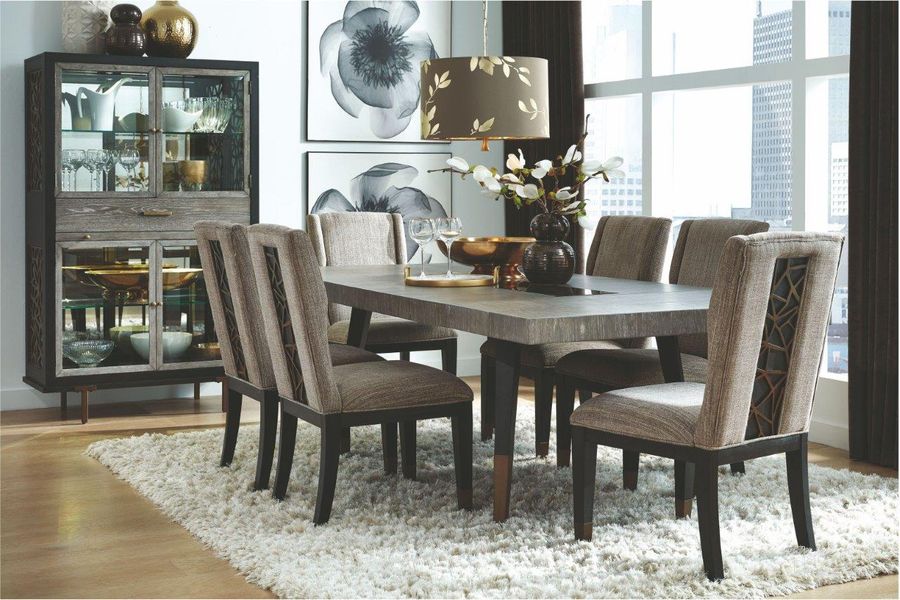 The appearance of Ryker Nocturn Black and Coventry Grey Rectangular Extendable Dining Room Set designed by Magnussen in the modern / contemporary interior design. This black piece of furniture  was selected by 1StopBedrooms from Ryker Collection to add a touch of cosiness and style into your home. Sku: D5013-20;D5013-66. Table Base Style: Legs. Product Type: Dining Room Set. Table Top Shape: Rectangular. Size: 44". Image1