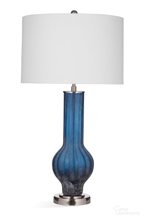 The appearance of Sandee Table Lamp In Blue and Brushed Steel designed by Bassett Mirror Company in the modern / contemporary interior design. This blue piece of furniture  was selected by 1StopBedrooms from  to add a touch of cosiness and style into your home. Sku: L4251T. Material: Metal. Product Type: Table Lamp. Image1