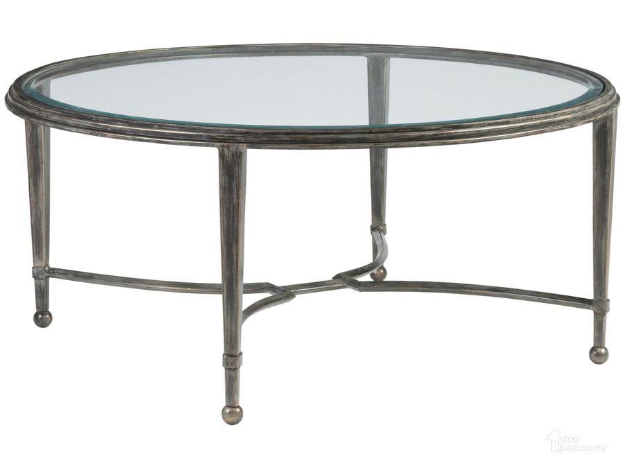 The appearance of Sangiovese St Laurent Round Cocktail Table designed by Artistica Home in the industrial interior design. This gray piece of furniture  was selected by 1StopBedrooms from Sangiovese Collection to add a touch of cosiness and style into your home. Sku: 01-2011-943-44. Product Type: Cocktail Table.