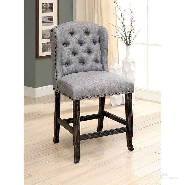 The appearance of Sania Counter Height Wingback Chair Set of 2 In Light Gray designed by Furniture of America in the rustic / southwestern interior design. This light gray piece of furniture  was selected by 1StopBedrooms from Sania Collection to add a touch of cosiness and style into your home. Sku: CM3324BK-LG-PCW-2PK. Material: Wood. Product Type: Counter Height Chair.