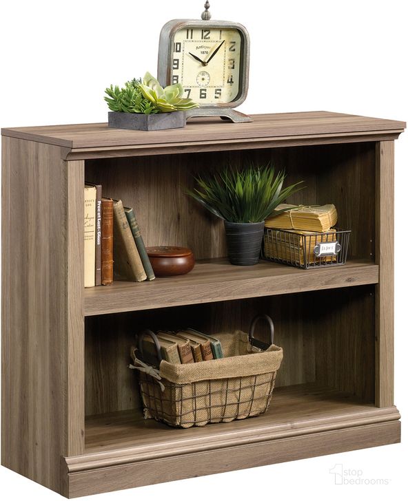 The appearance of Sauder Select 2-Shelf Bookcase In Salt Oak designed by Sauder in the transitional interior design. This salt oak piece of furniture  was selected by 1StopBedrooms from Sauder Select Collection to add a touch of cosiness and style into your home. Sku: 420179. Product Type: Bookcase. Material: Engineered Wood. Image1