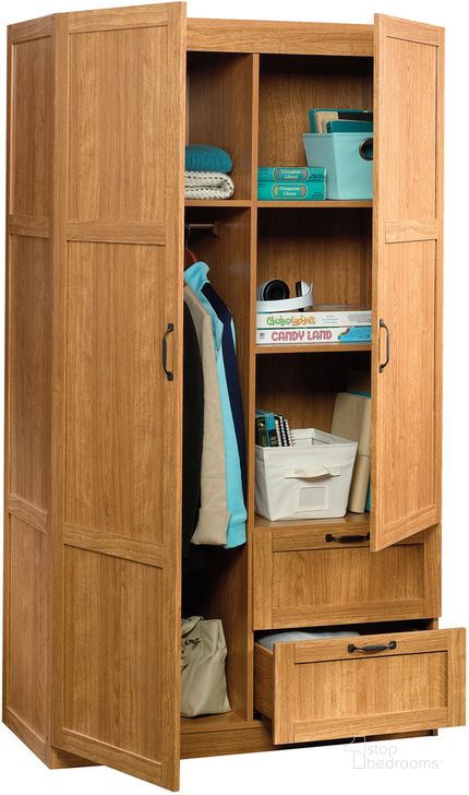 The appearance of Sauder Select Storage Cabinet Wardrobe In Highland Oak designed by Sauder in the transitional interior design. This highland oak piece of furniture  was selected by 1StopBedrooms from Sauder Select Collection to add a touch of cosiness and style into your home. Sku: 420063. Product Type: Wardrobe. Material: Engineered Wood. Image1