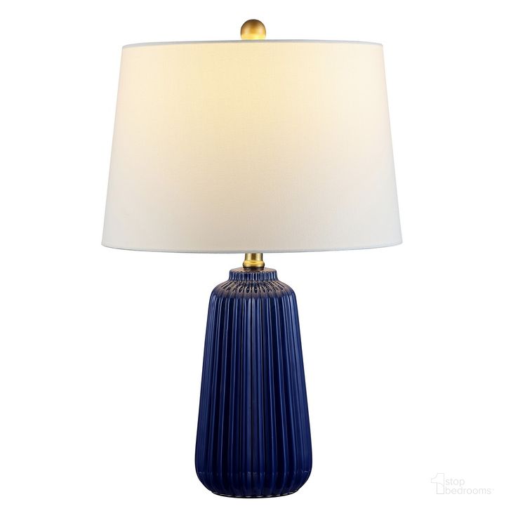 The appearance of Sawyer Ceramic Table Lamp in Navy Blue designed by Safavieh in the modern / contemporary interior design. This navy blue piece of furniture  was selected by 1StopBedrooms from Sawyer Collection to add a touch of cosiness and style into your home. Sku: TBL4344B. Material: Ceramic. Product Type: Table Lamp. Image1