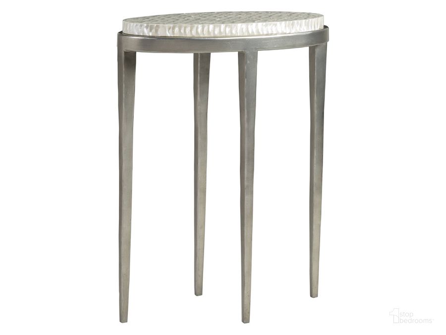 The appearance of Signature Designs Brilliante Spot Table designed by Artistica Home in the transitional interior design. This chrome piece of furniture  was selected by 1StopBedrooms from Signature Designs Collection to add a touch of cosiness and style into your home. Sku: 01-2173-951. Product Type: End Table. Image1