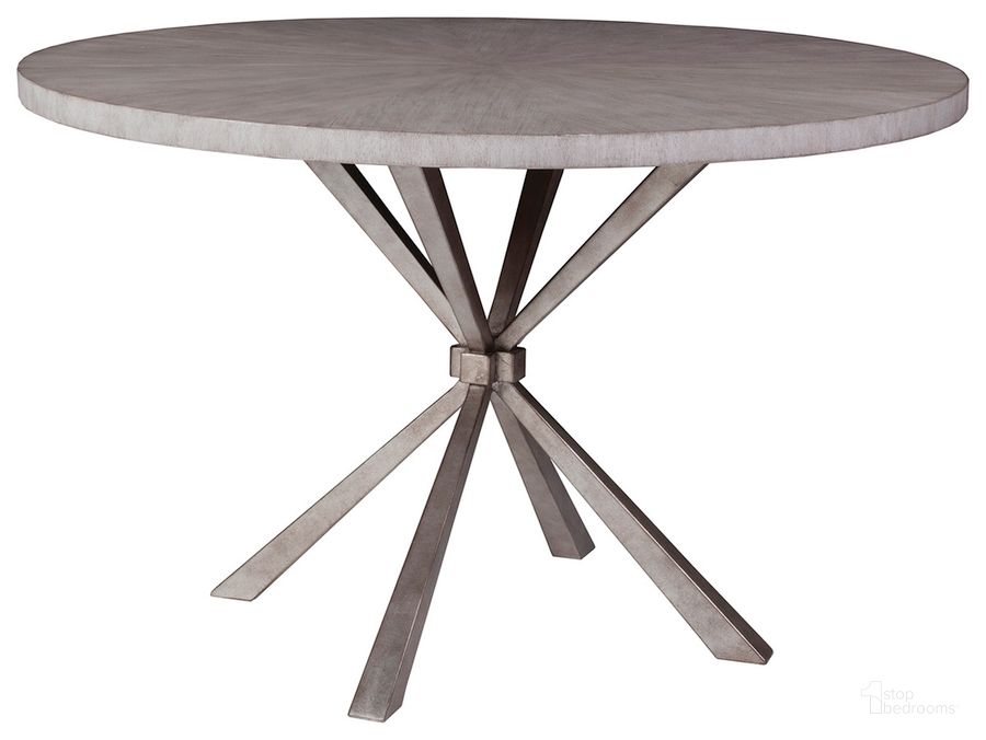 The appearance of Signature Designs Wire Brushed Light Grey And Silver Leaf Iteration Round Dining Table designed by Artistica Home in the transitional interior design. This gray piece of furniture  was selected by 1StopBedrooms from Signature Designs Collection to add a touch of cosiness and style into your home. Sku: 01-2085-870C. Table Base Style: Pedestal. Table Top Shape: Round. Product Type: Dining Table. Size: 48". Image1