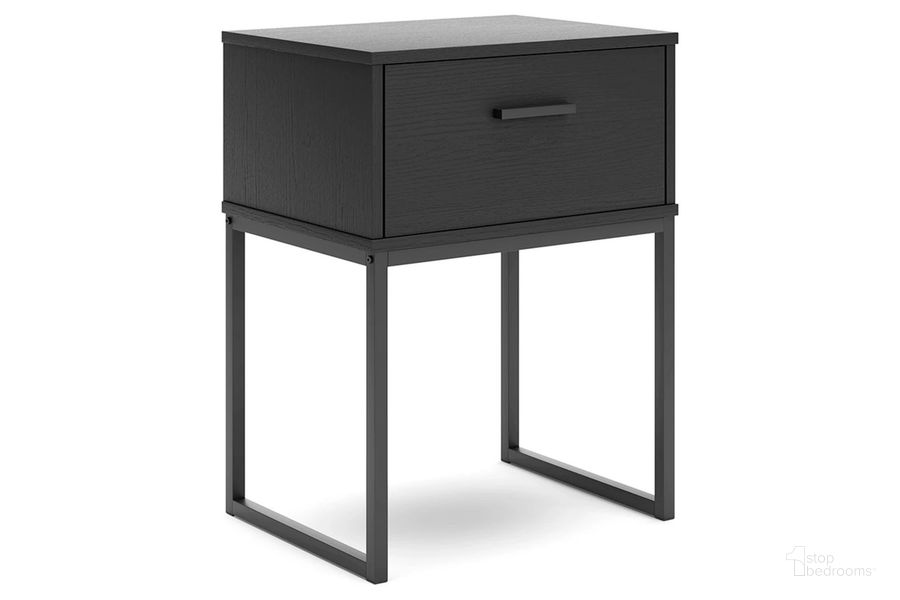 The appearance of Socalle Nightstand In Black designed by Signature Design by Ashley in the transitional interior design. This black piece of furniture  was selected by 1StopBedrooms from Socalle Collection to add a touch of cosiness and style into your home. Sku: EB1865-291. Product Type: Nightstand. Image1