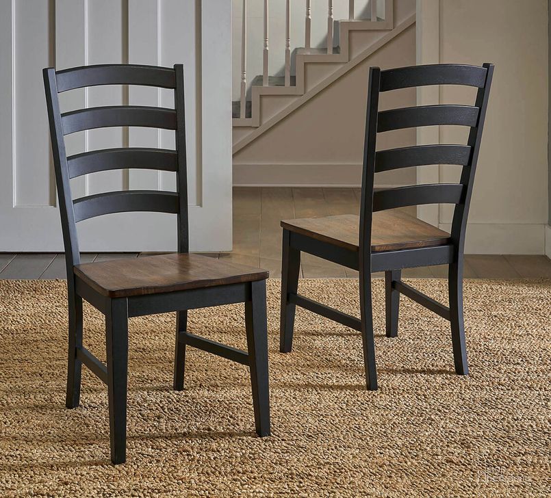 The appearance of Stormy Ridge Ladderback Chair with Wood Seat Set of 2 In Chickory Black designed by A-America in the transitional interior design. This black piece of furniture  was selected by 1StopBedrooms from Stormy Ridge Collection to add a touch of cosiness and style into your home. Sku: STOBL2552. Product Type: Side Chair. Material: Rubberwood. Image1