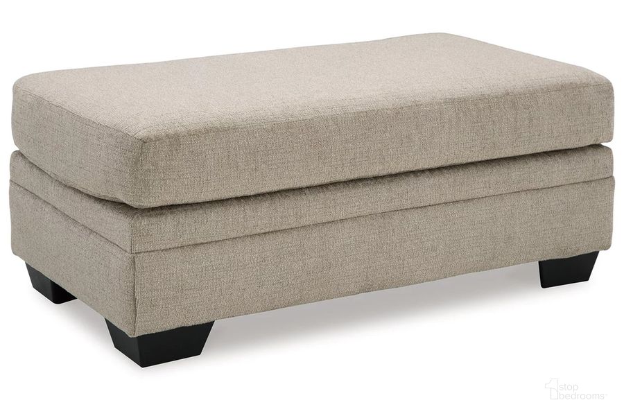 The appearance of Stonemeade Ottoman In Taupe designed by Signature Design by Ashley in the modern / contemporary interior design. This taupe piece of furniture  was selected by 1StopBedrooms from Stonemeade Collection to add a touch of cosiness and style into your home. Sku: 5950414. Material: Fabric. Product Type: Ottoman. Image1