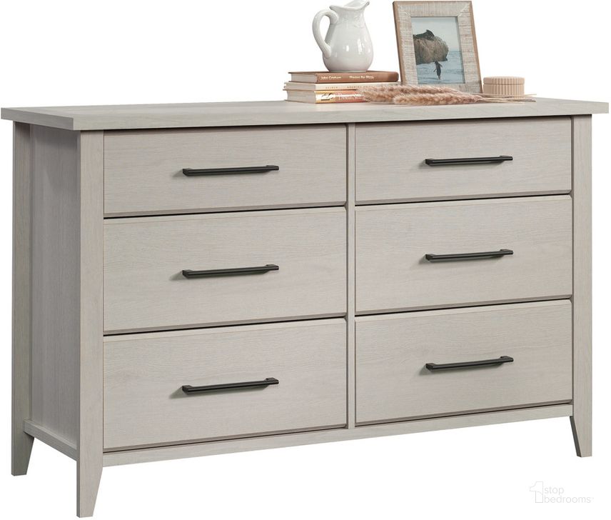The appearance of Summit Station Dresser In Glacier Oak designed by Sauder in the transitional interior design. This glacier oak piece of furniture  was selected by 1StopBedrooms from Summit Station Collection to add a touch of cosiness and style into your home. Sku: 431999. Product Type: Dresser. Material: Engineered Wood. Image1