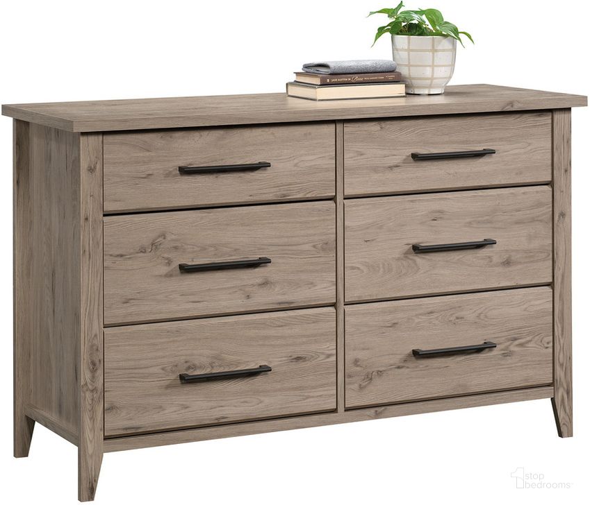 The appearance of Summit Station Dresser In Laurel Oak designed by Sauder in the transitional interior design. This laurel oak piece of furniture  was selected by 1StopBedrooms from Summit Station Collection to add a touch of cosiness and style into your home. Sku: 425109. Product Type: Dresser. Material: Engineered Wood. Image1