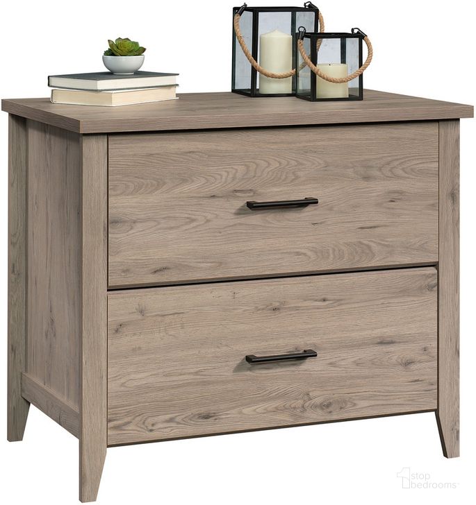 The appearance of Summit Station Lateral File In Laurel Oak designed by Sauder in the transitional interior design. This laurel oak piece of furniture  was selected by 1StopBedrooms from Summit Station Collection to add a touch of cosiness and style into your home. Sku: 428397. Product Type: File Cabinet. Material: Engineered Wood. Image1