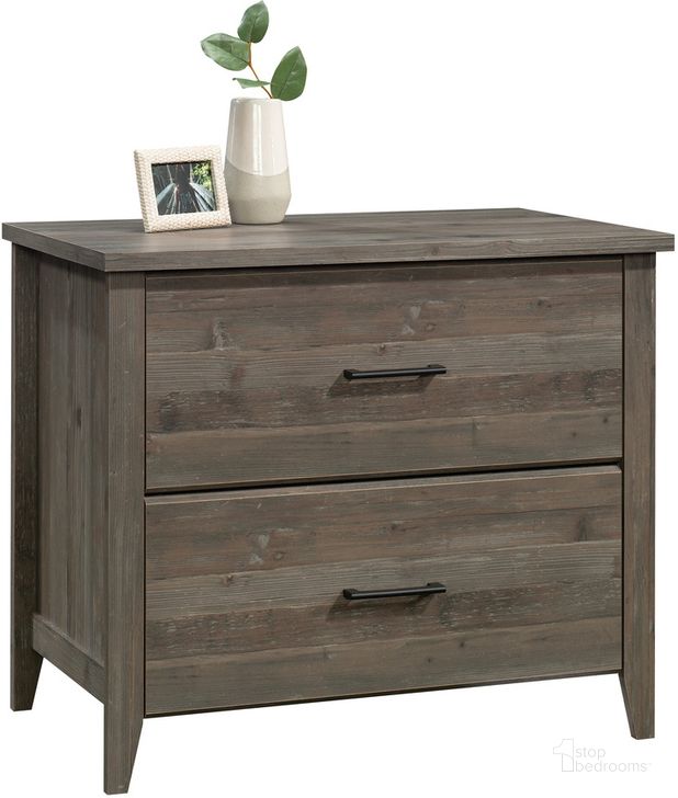 The appearance of Summit Station Lateral File In Pebble Pine designed by Sauder in the transitional interior design. This pebble pine piece of furniture  was selected by 1StopBedrooms from Summit Station Collection to add a touch of cosiness and style into your home. Sku: 429321. Product Type: File Cabinet. Material: Engineered Wood. Image1