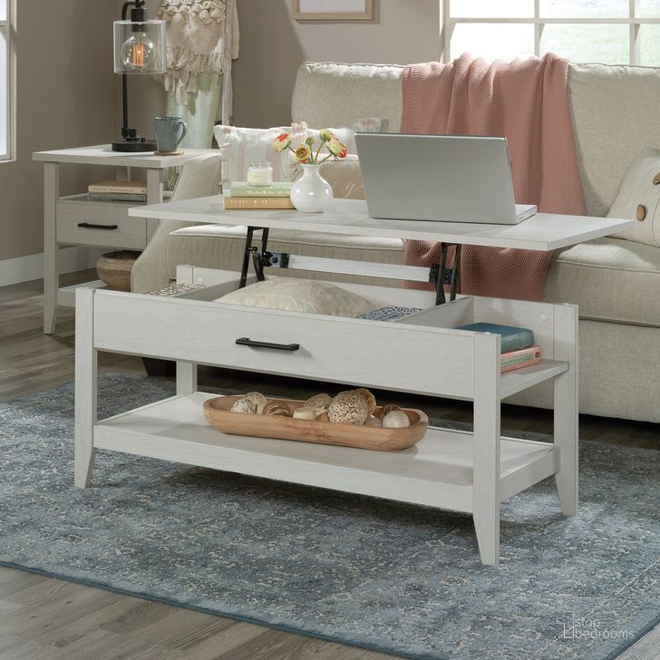 The appearance of Summit Station Lift-Top Coffee Table In Glacier Oak designed by Sauder in the transitional interior design. This glacier oak piece of furniture  was selected by 1StopBedrooms from Summit Station Collection to add a touch of cosiness and style into your home. Sku: 431997. Product Type: Coffee Table. Material: Engineered Wood. Image1