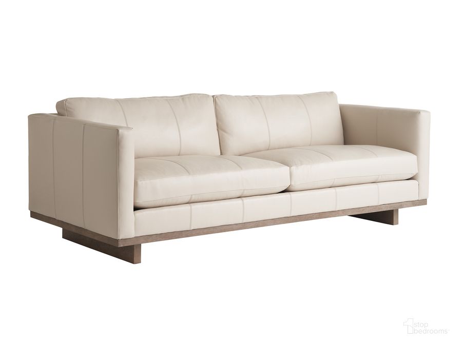 The appearance of Sunset Key Brixton Leather Sofa In Champagne designed by Tommy Bahama in the modern / contemporary interior design. This champagne piece of furniture  was selected by 1StopBedrooms from Sunset Key Collection to add a touch of cosiness and style into your home. Sku: 01-7585-33-LL-40. Product Type: Sofa. Image1
