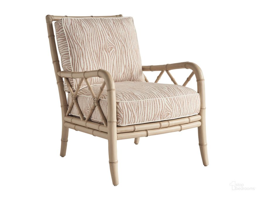 The appearance of Sunset Key Heydon Chair In Champagne designed by Tommy Bahama in the modern / contemporary interior design. This champagne piece of furniture  was selected by 1StopBedrooms from Sunset Key Collection to add a touch of cosiness and style into your home. Sku: 01-1576-11-42. Product Type: Chair. Image1
