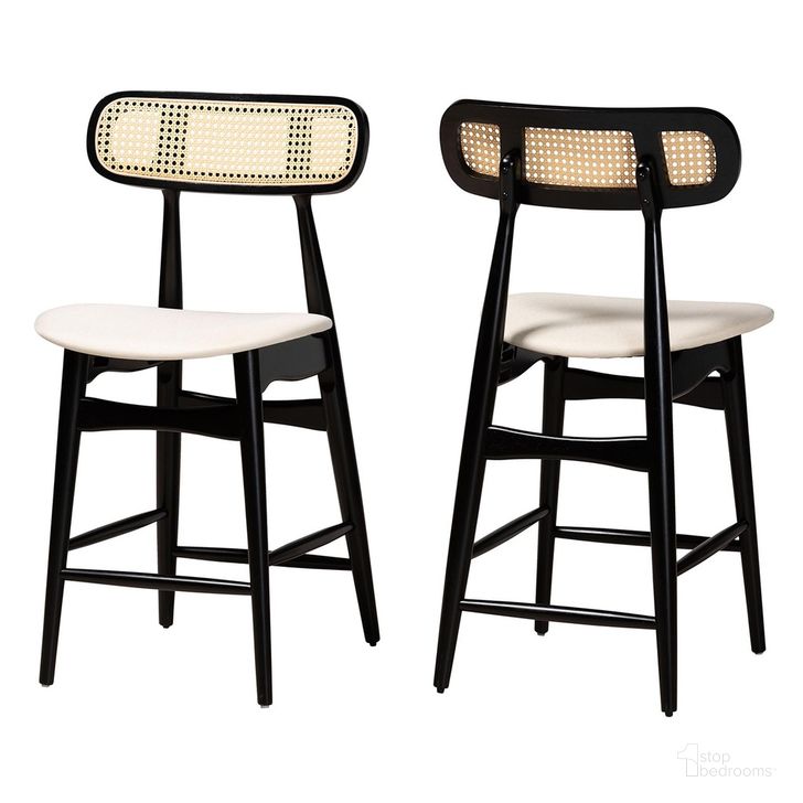 The appearance of Tarana Wood Counter Stool Set of 2 In Cream and Black designed by Baxton Studio in the transitional interior design. This cream and black piece of furniture  was selected by 1StopBedrooms from Tarana Collection to add a touch of cosiness and style into your home. Sku: CS002P-Black/Cream-PC-2PK. Product Type: Barstool. Material: Rubberwood. Image1