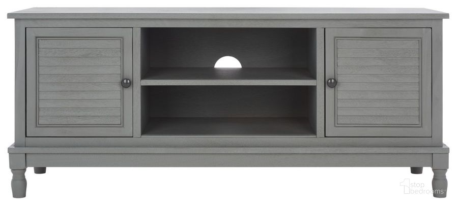 The appearance of Tate 2 Door 1 Shelf Media Stand in Distressed Grey designed by Safavieh in the modern / contemporary interior design. This distressed grey piece of furniture  was selected by 1StopBedrooms from Tate Collection to add a touch of cosiness and style into your home. Sku: MED5708C. Material: Wood. Product Type: Media Unit. Image1