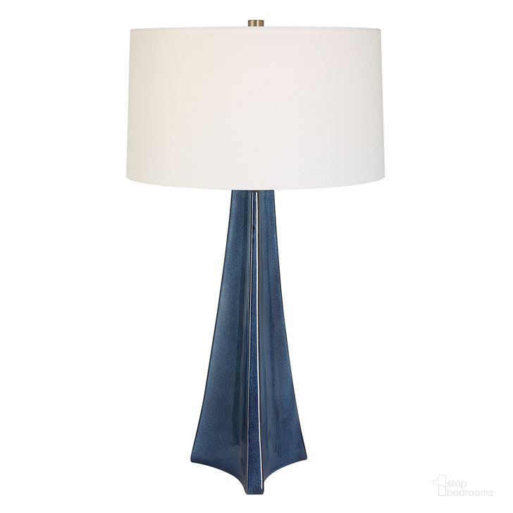The appearance of Teramo Scalloped Ceramic Table Lamp In Brown and Blue designed by Uttermost in the  interior design. This brown/blue piece of furniture  was selected by 1StopBedrooms from Teramo Collection to add a touch of cosiness and style into your home. Sku: 30229. Product Type: Table Lamp. Material: Iron. Image1